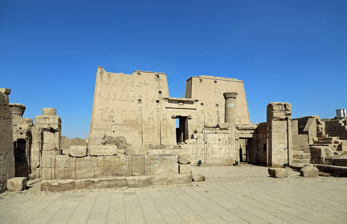 Edfu temple pylon and forecourt in bright sun